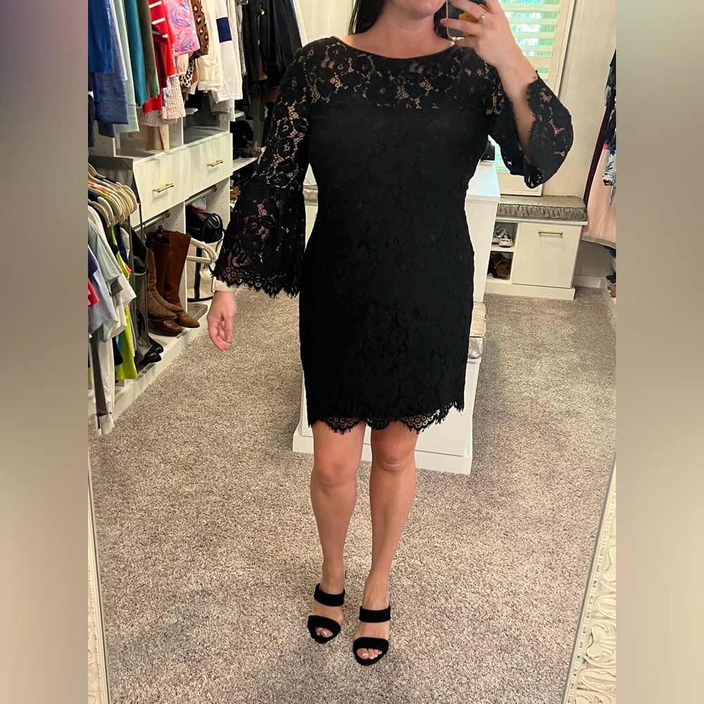 Lacy black Ralph Lauren Shift dress. Semi sheer top and lace scalloped hem